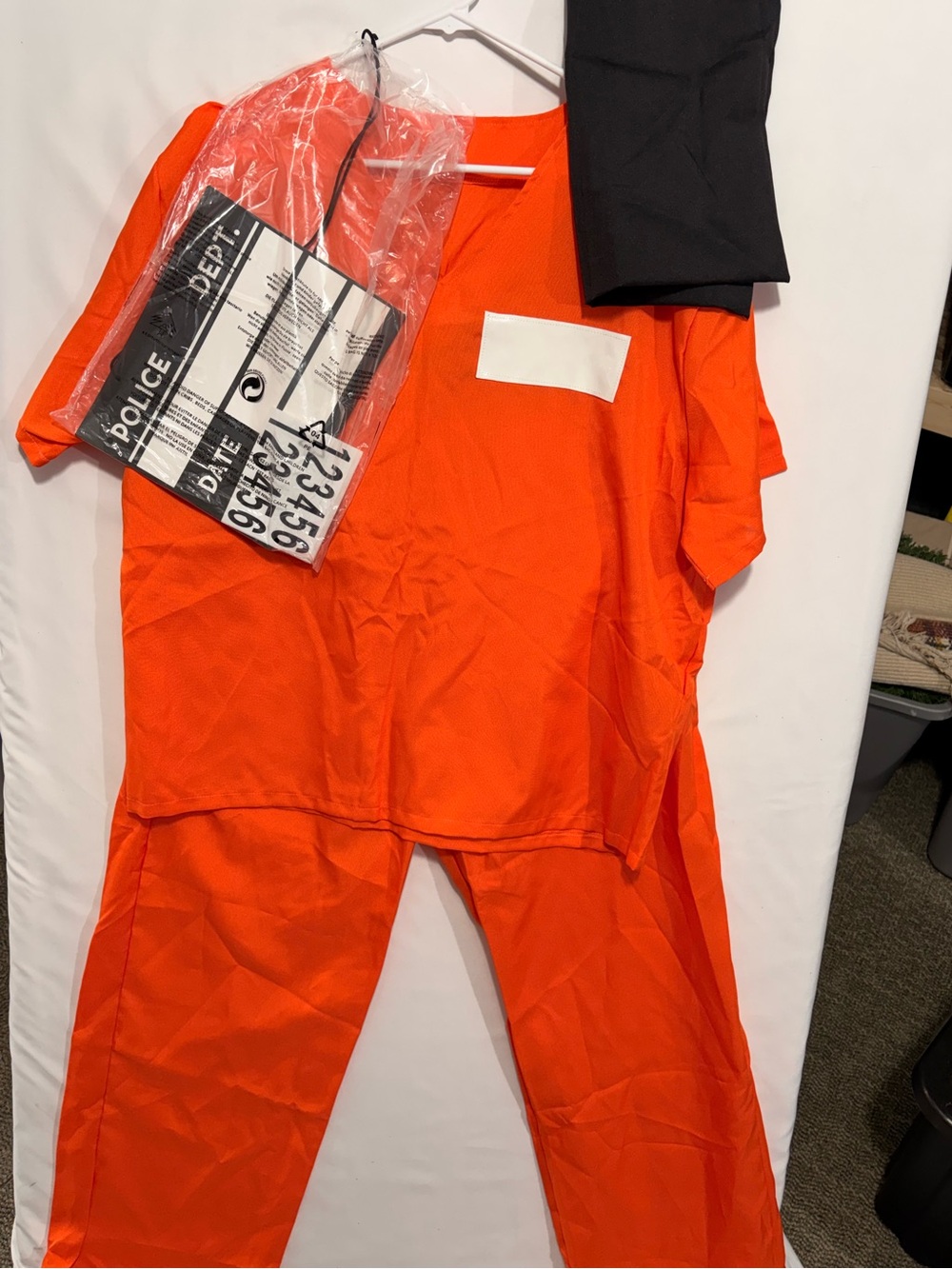 Adult 2XL Orange Prisoner Costume with Mugshot Sign and handcuffs.